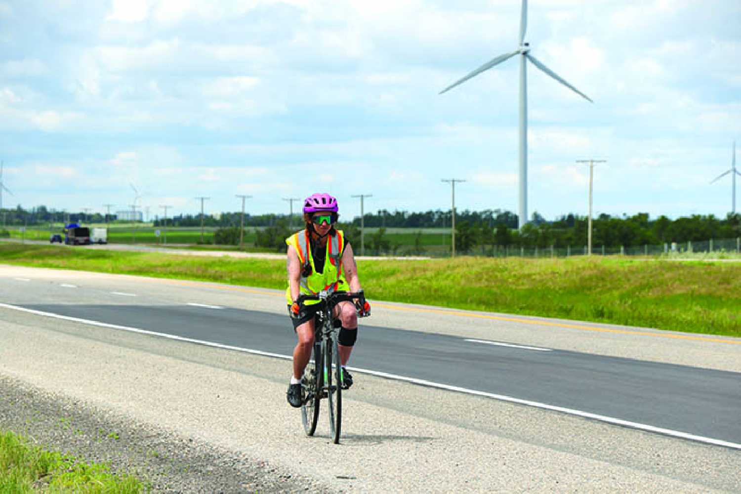 Jade Dulle cycles through the Moosomin area on her ride across Canada to raise awareness of mental health issues.